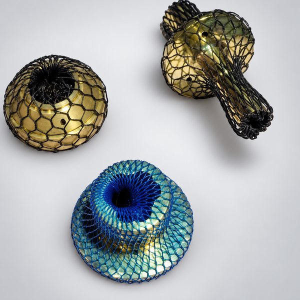 Brass spare parts in protective netting